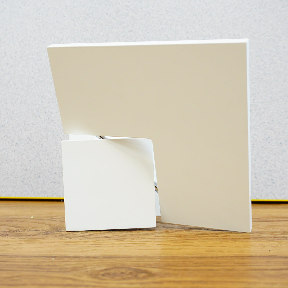 7-Inch Square Puzzle LED Wall Sconce in White with Twisting Design