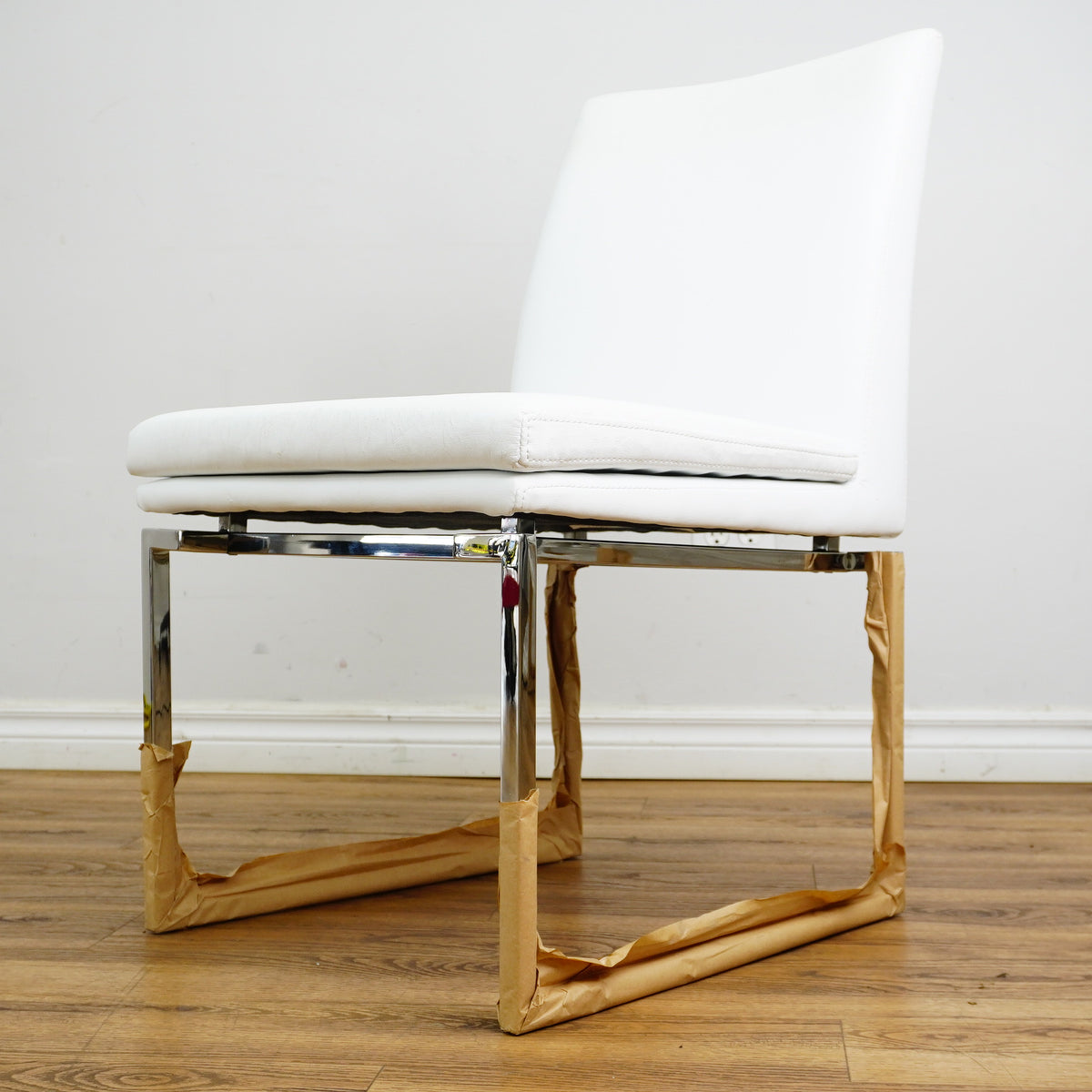 26×20×33-In Side Chair - White Naugahyde & Polished Stainless - Creased