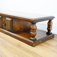 66×22×16–Inch Columnar Media Console – Dark Wood with Cabinet Storage