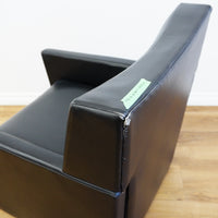 28×32×33‑Inch Black Leather Armchair – Angular Profile, Cushioned Seat & Back