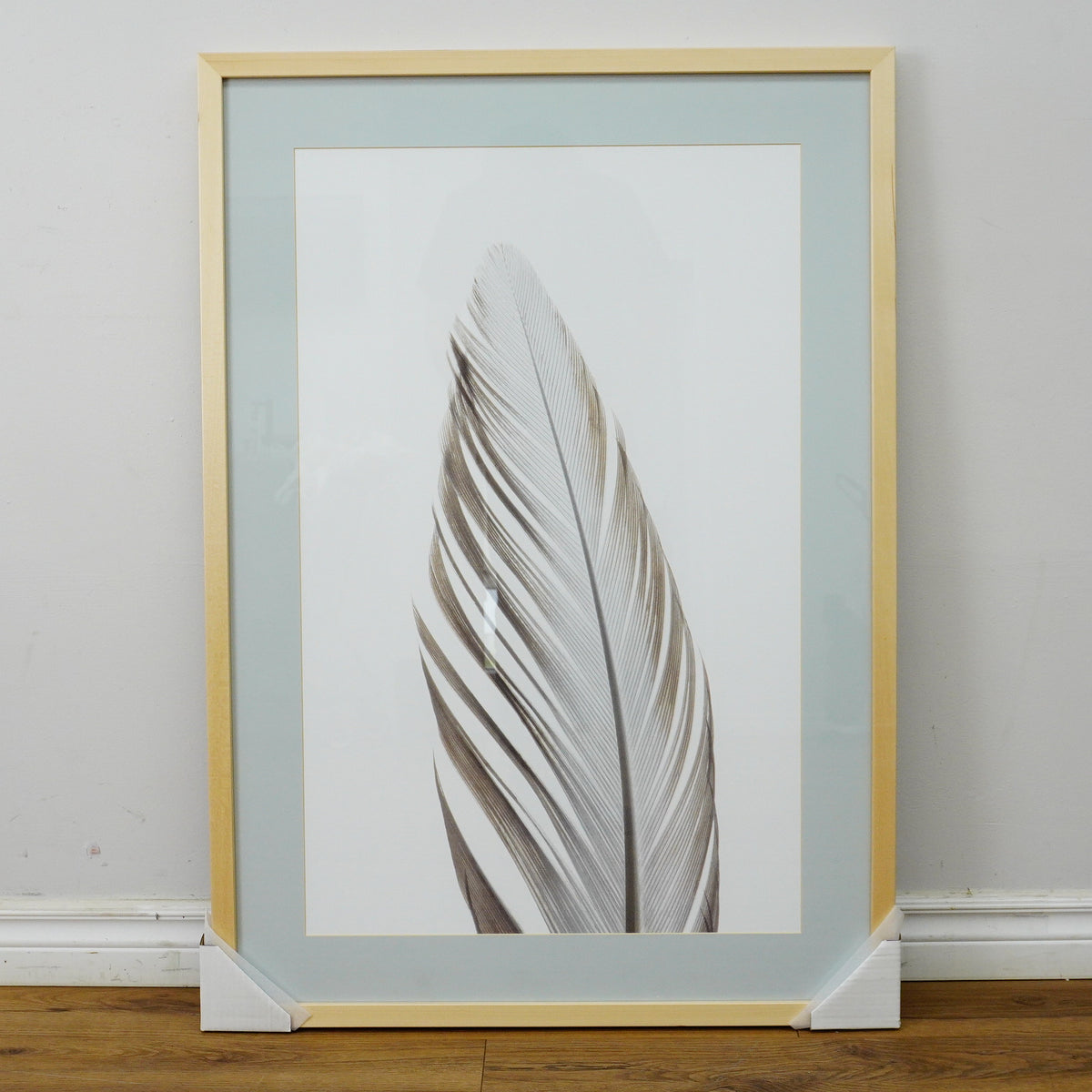 28×40–Inch Feather Framed Print – Matte Paper, Light Wood Frame