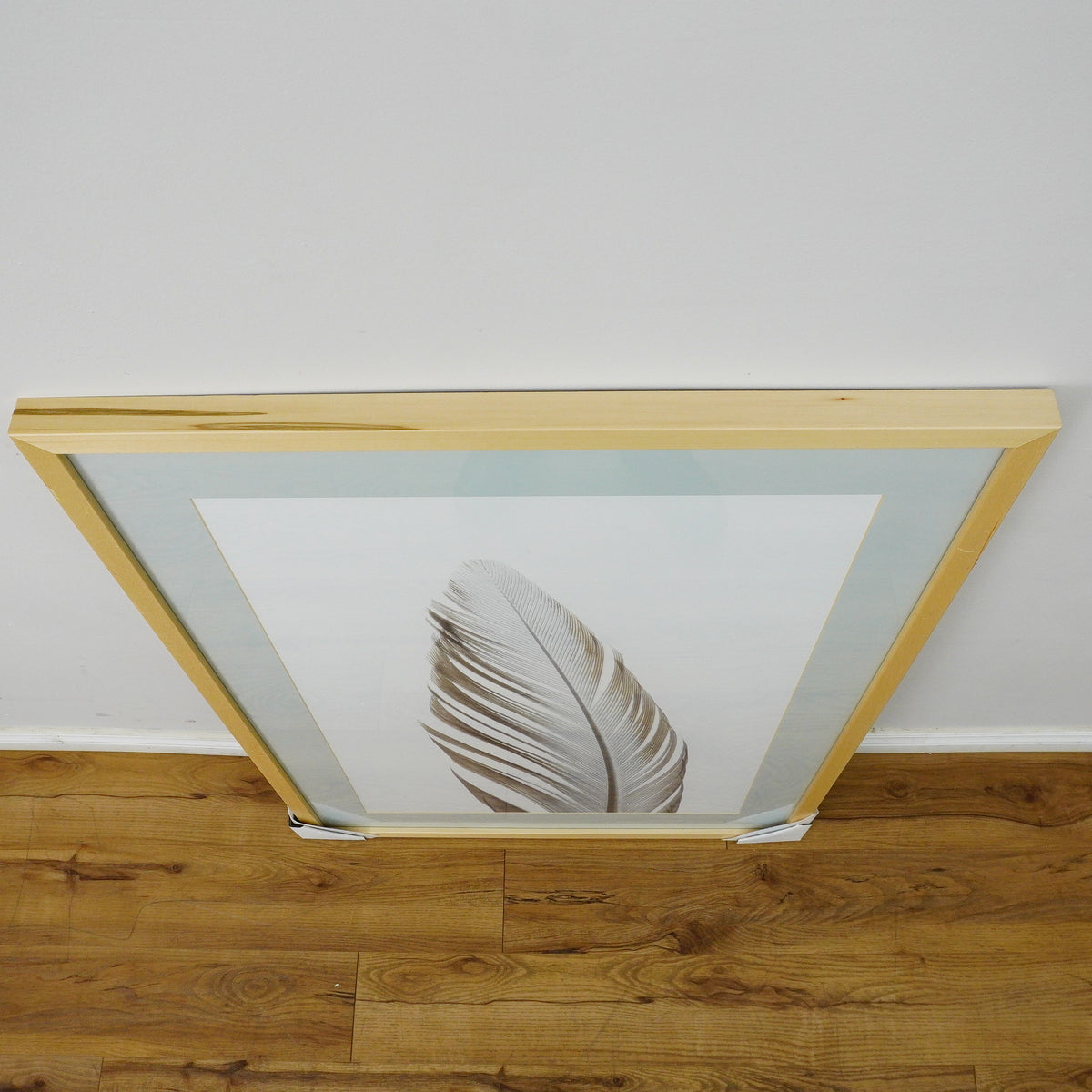 28×40–Inch Feather Framed Print – Matte Paper, Light Wood Frame