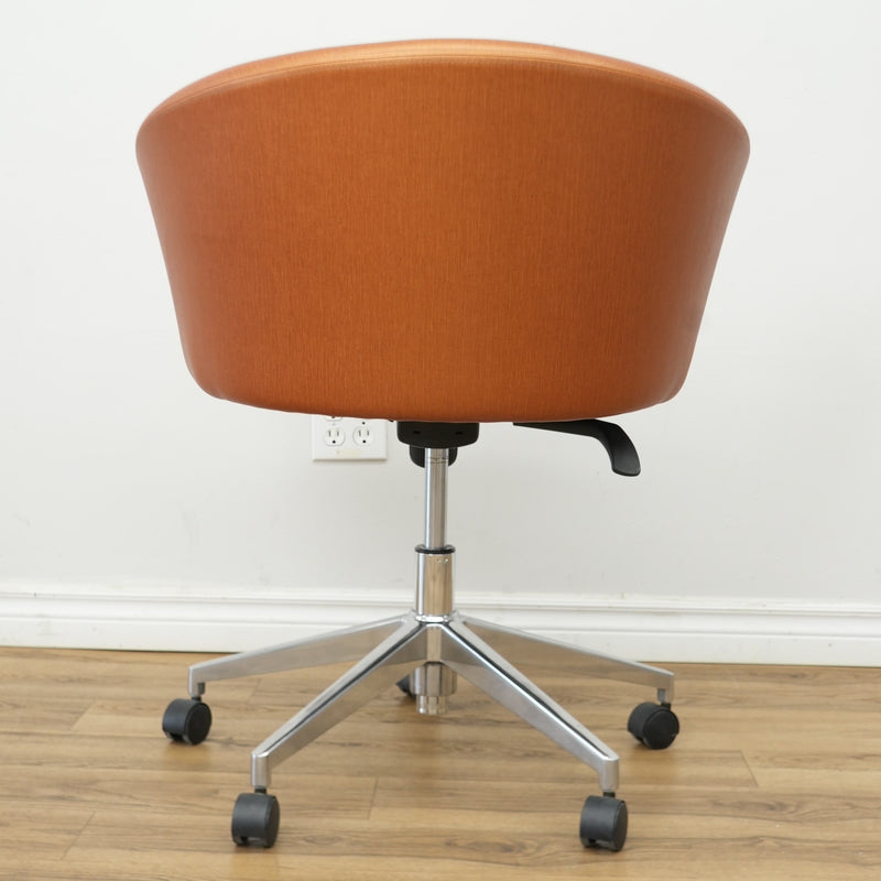 Faux Leather Chair with Wheels in Brownish Orange