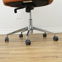 Faux Leather Chair with Wheels in Brownish Orange