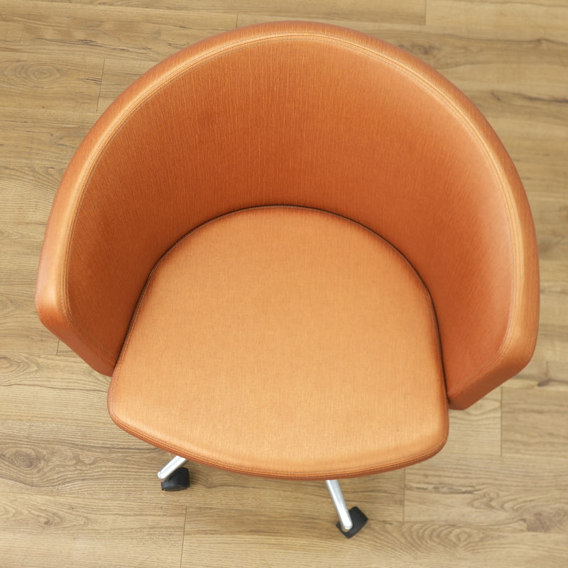Faux Leather Chair with Wheels in Brownish Orange