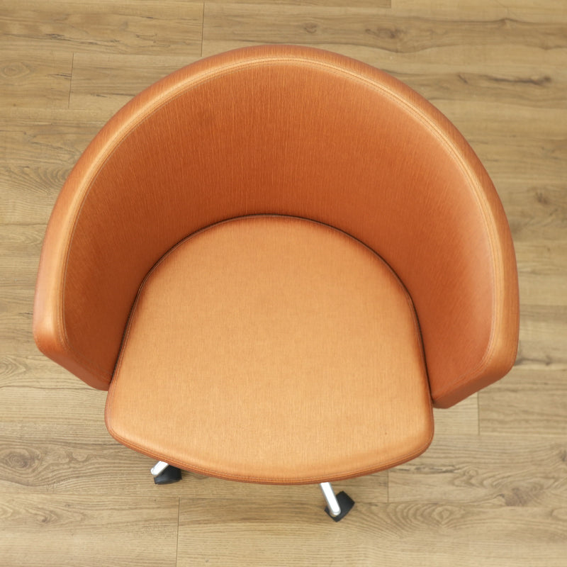 Faux Leather Chair with Wheels in Brownish Orange