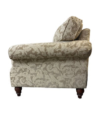Cream floral patterned love-seat