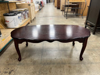 Long Circular Dark Mahogany Coffee Table