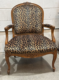 Vintage French Louis XV-style Carved Wood Armchair Featuring Striking Leopard-Print Upholstery and Elegant Cabriole Legs.
