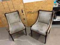 Antique French Louis XVI-style Carved Wood Armchair Features a Striking Geometric-Patterned Fabric Upholstery.