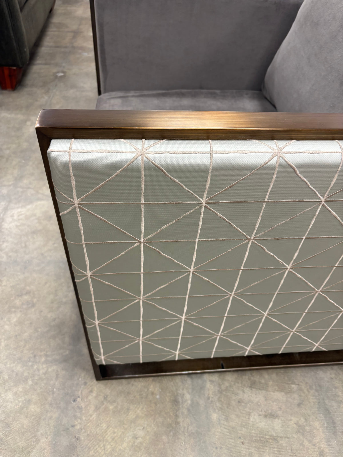 Grey Lounge Chair with Patterned Sides