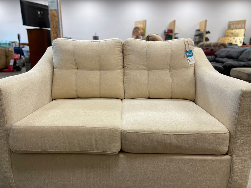 Beige Love Seat With Plastic Feet