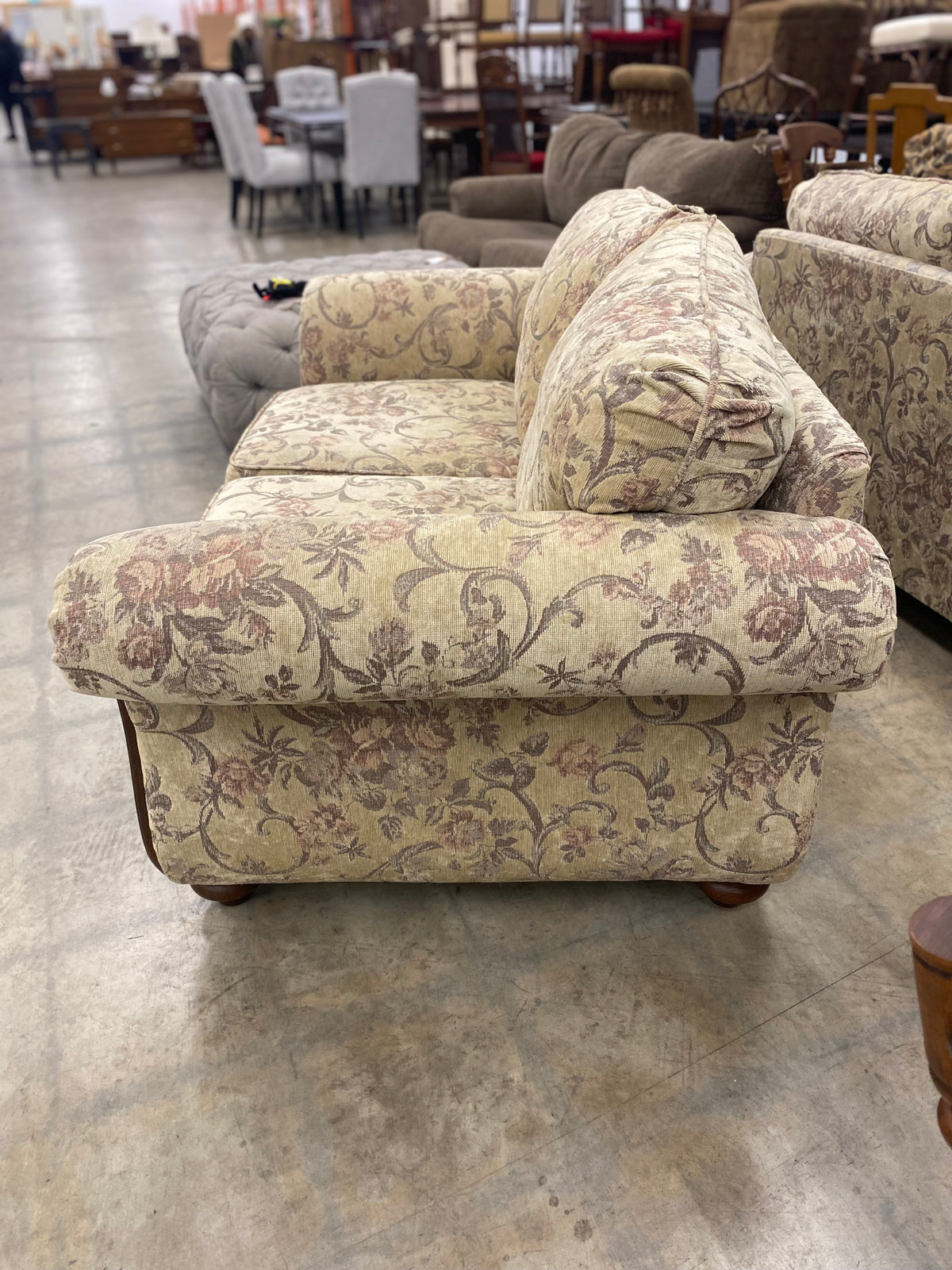 Floral And Dark Wood Loveseat