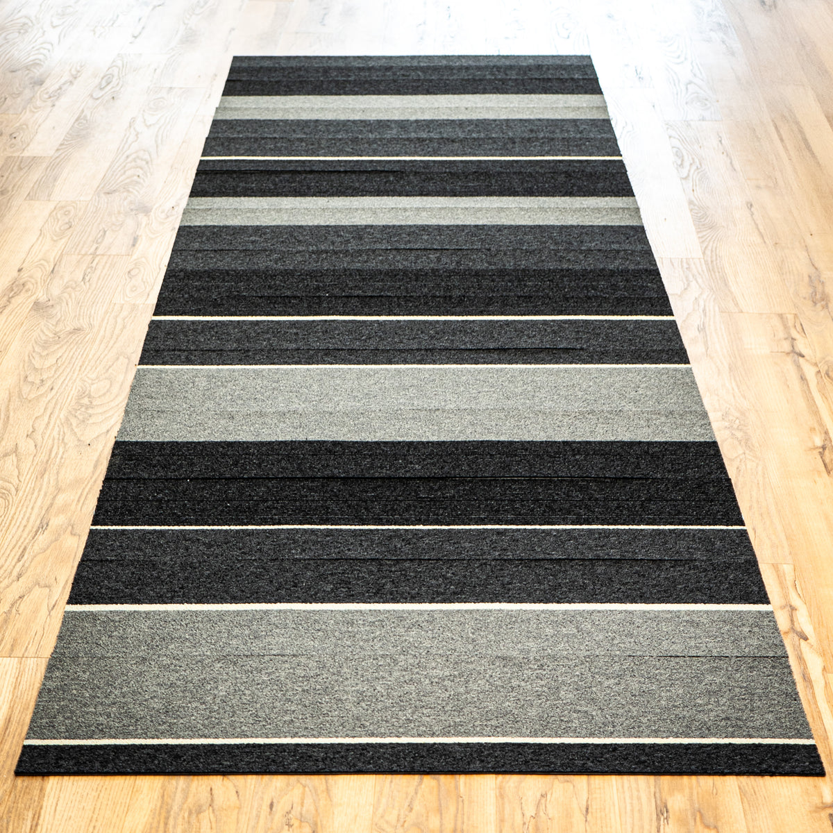 9.84" x 39.36" Striped Carpet Tiles in Modern Grey and Black - 20 pcs (53.8 sq. ft./box)