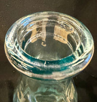Antique Late 19th-Century Aqua Glass Bottle with Embossed Stars and Panels