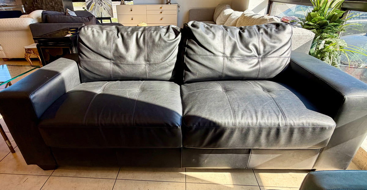 Sleek Contemporary Black Vinyl Three-Seater Sofa with Block Track Arms