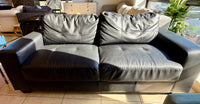 Sleek Contemporary Black Vinyl Three-Seater Sofa with Block Track Arms