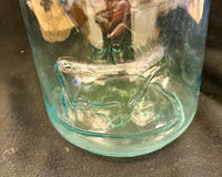 Antique Late 19th-Century Aqua Glass Bottle with Embossed Stars and Panels