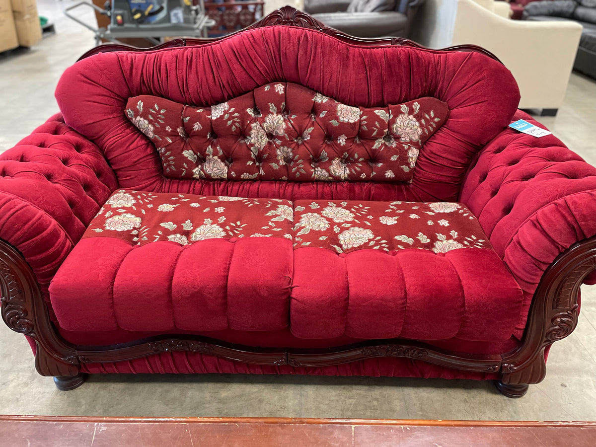 Red Love Seat With Floral Pattern