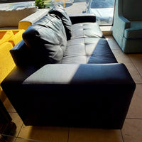 Sleek Contemporary Black Vinyl Three-Seater Sofa with Block Track Arms