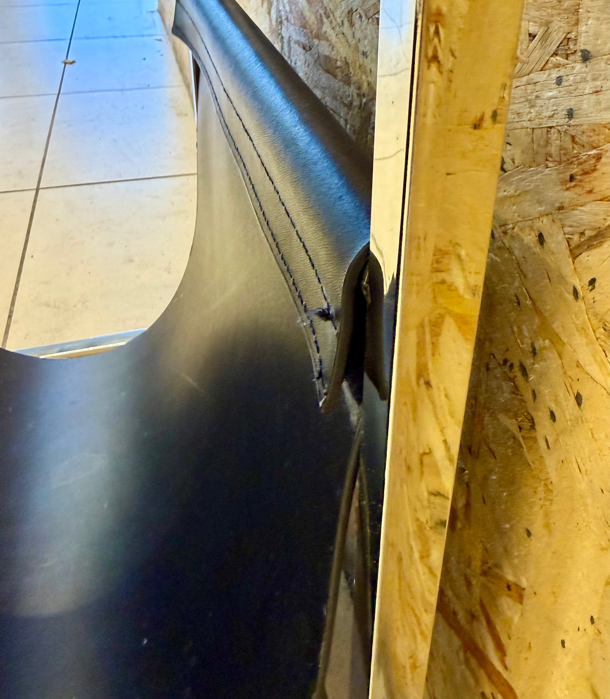 Sleek Modern Black Marble and Chrome Accent Table with Integrated Magazine Sling