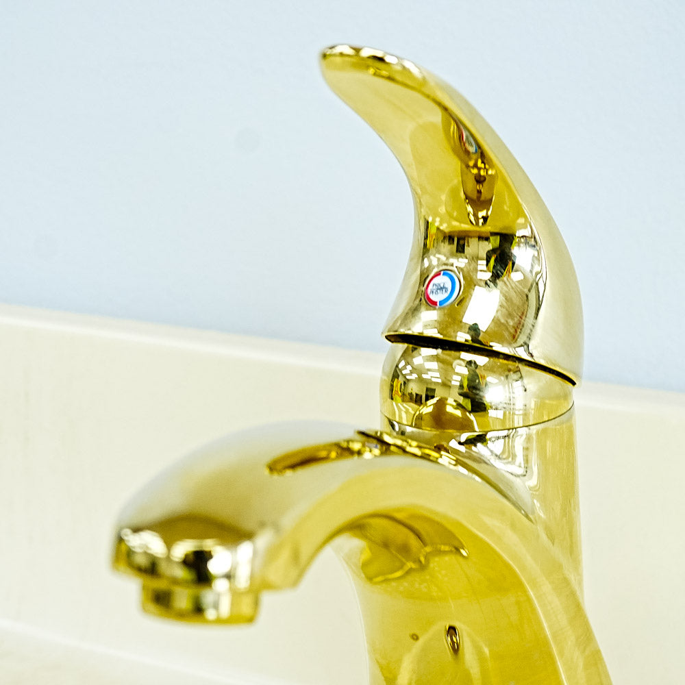 White Bathroom Vanity with Yellow Countertop, Gold Faucet, and Sink