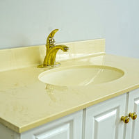 White Bathroom Vanity with Yellow Countertop, Gold Faucet, and Sink