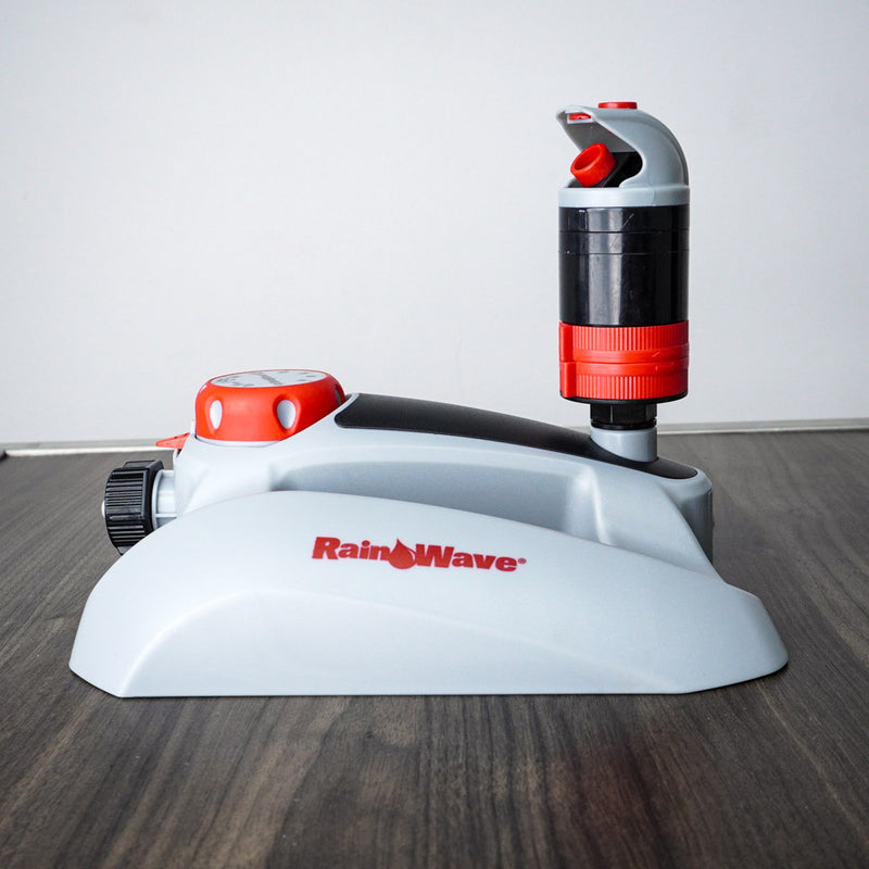 10-Inch Rainwave Multi-Pattern Rotary Sprinkler in Red with Timer on Base
