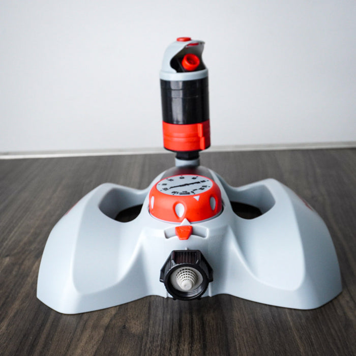 10-Inch Rainwave Multi-Pattern Rotary Sprinkler in Red with Timer on Base