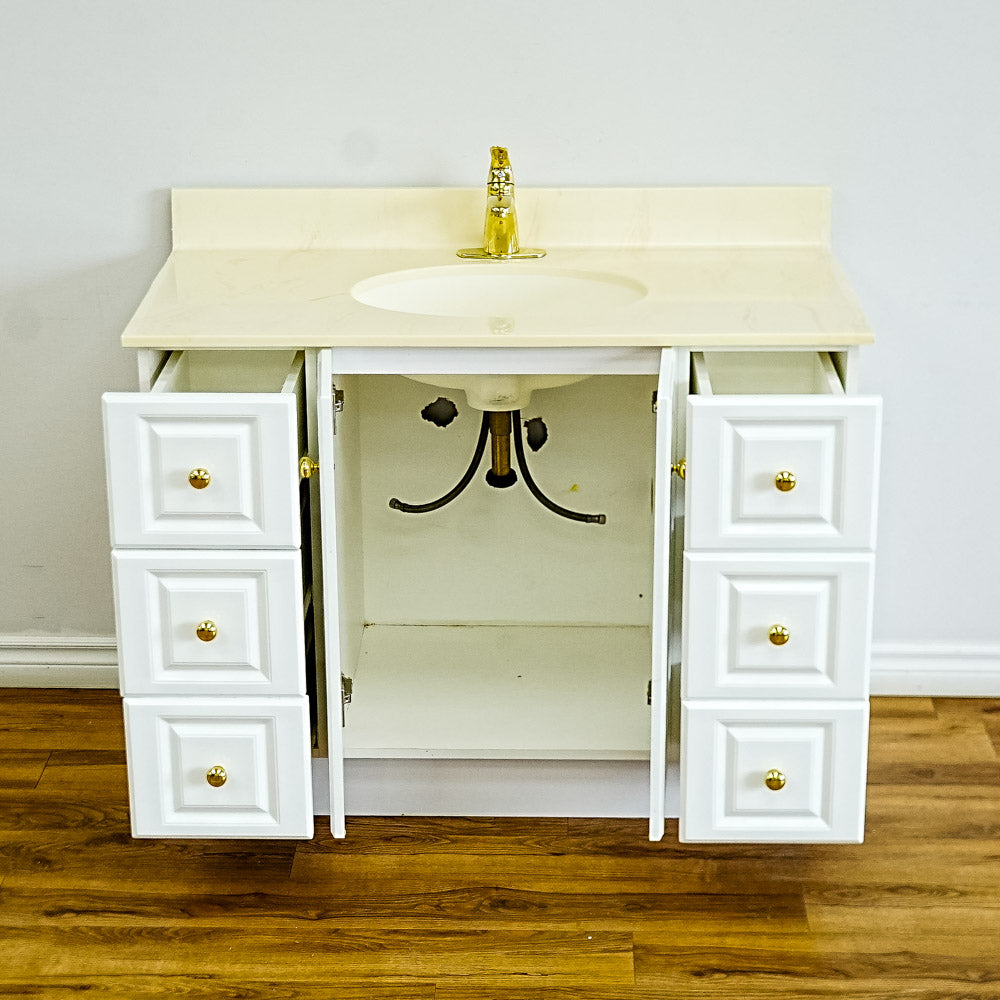 White Bathroom Vanity with Yellow Countertop, Gold Faucet, and Sink