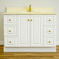 White Bathroom Vanity with Yellow Countertop, Gold Faucet, and Sink