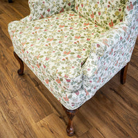 42-Inch Wingback Armchair with Floral Design on Cream Background