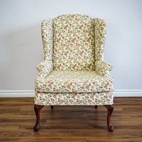 42-Inch Wingback Armchair with Floral Design on Cream Background