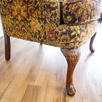 42-Inch Wingback Armchair with Brown and Gold Floral Design