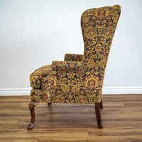 42-Inch Wingback Armchair with Brown and Gold Floral Design