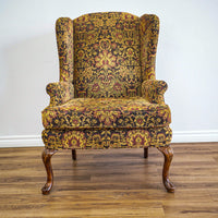 42-Inch Wingback Armchair with Brown and Gold Floral Design