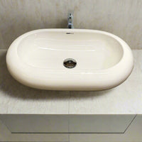 Minimalistic Oval Bathroom Sink – Glossy White with Center Drain (25” W)