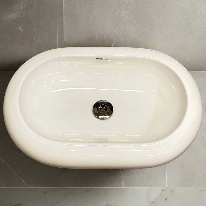 Minimalistic Oval Bathroom Sink – Glossy White with Center Drain (25” W)