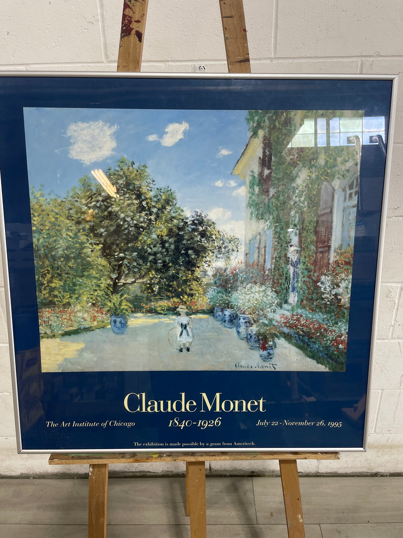 26"W Claude Monet painting with silver frame