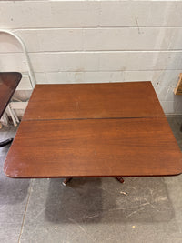 Solid wooden foldable dining table