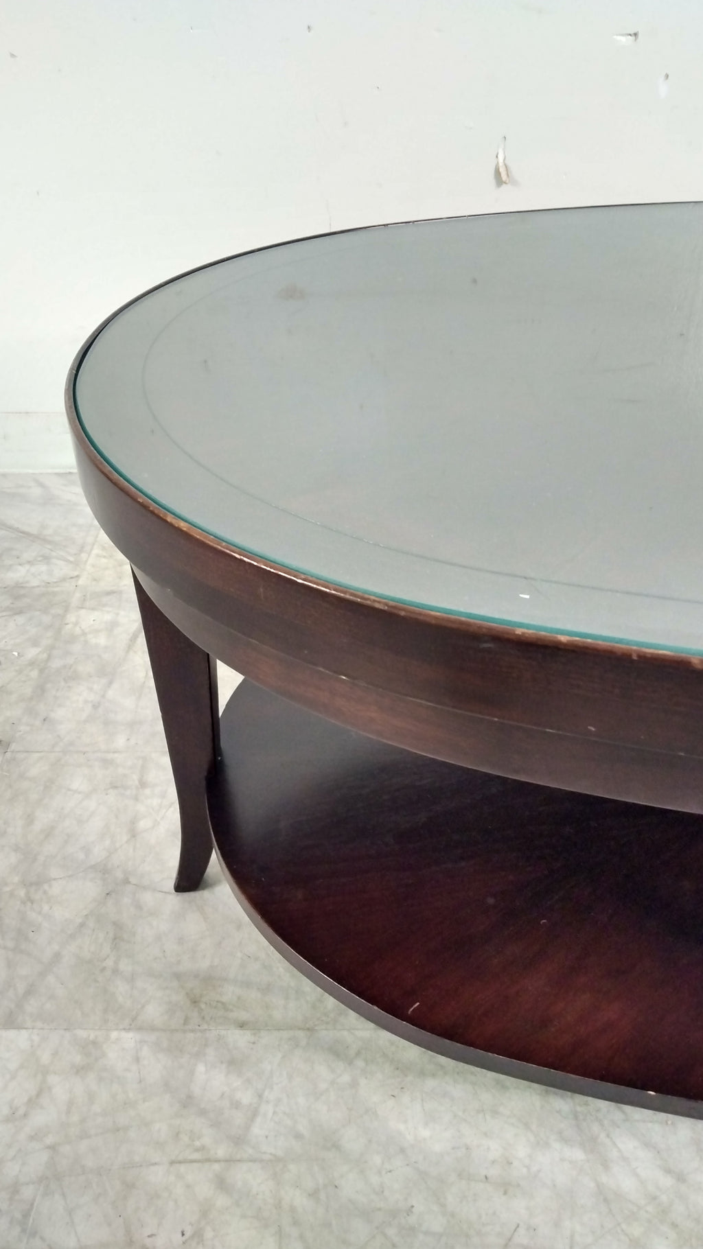 Dark Oval Glass Coffee Table