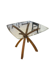 Modern Glass Top Dining Table with Sculptural Base