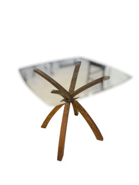 Modern Glass Top Dining Table with Sculptural Base