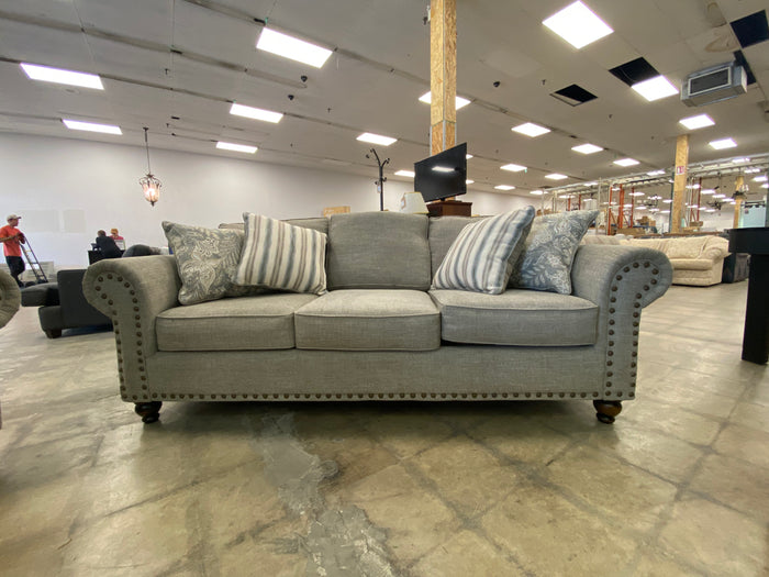 Light Gray Sofa with 4 Patterned Throw Pillow