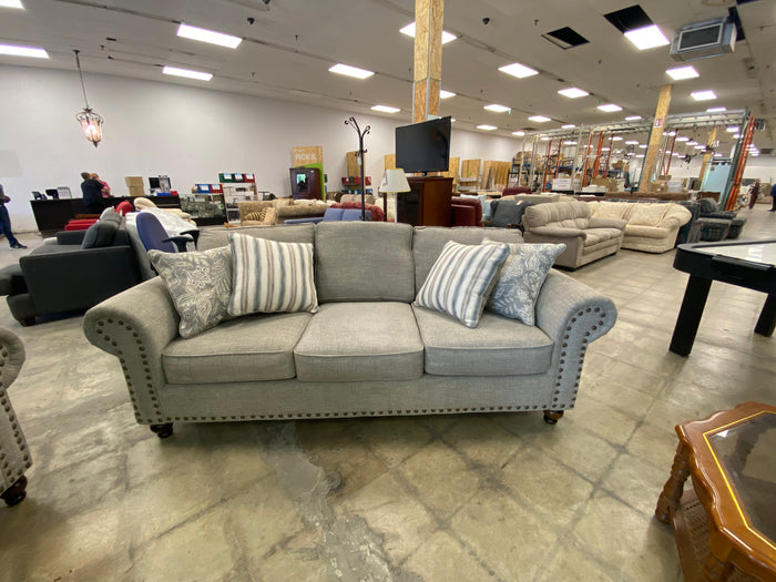 Light Gray Sofa with 4 Patterned Throw Pillow