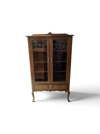 Knechtel Furniture Display Cabinet with Glass Front Doors and Lower Drawer