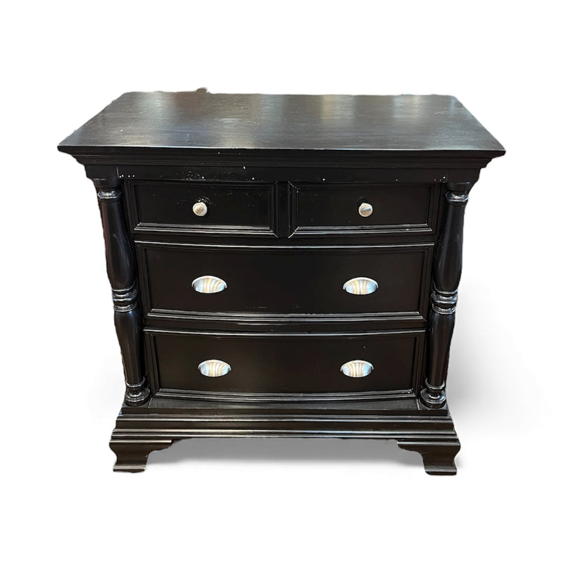 Black Dresser With Carved Detailing