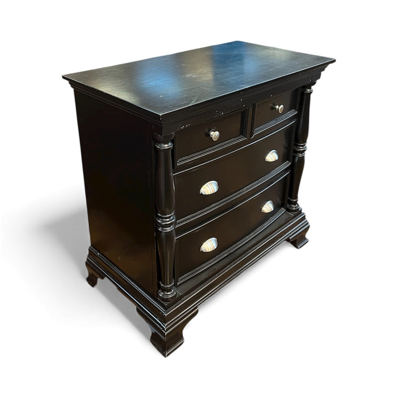 Black Dresser With Carved Detailing