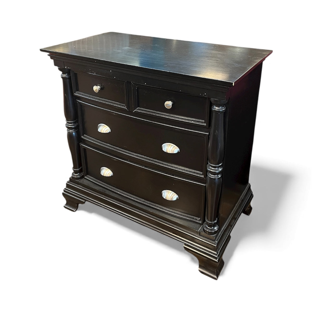 Black Dresser With Carved Detailing