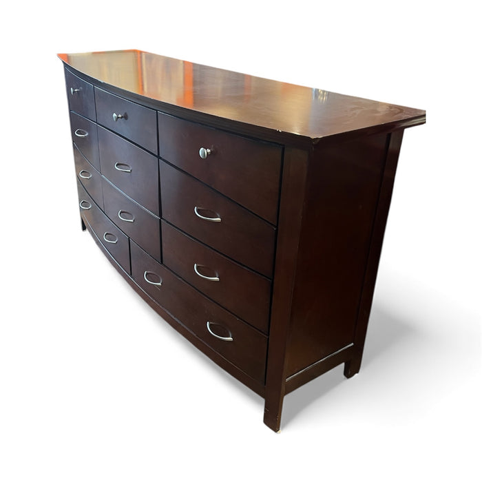 Dark Brown Curved Dresser With Silver Hardware